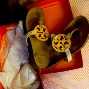 Tan in color with the Burch logo